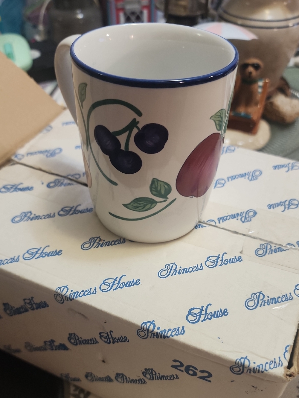 Princess House White Ceramic Mug with Blue Rim and Fruit Design